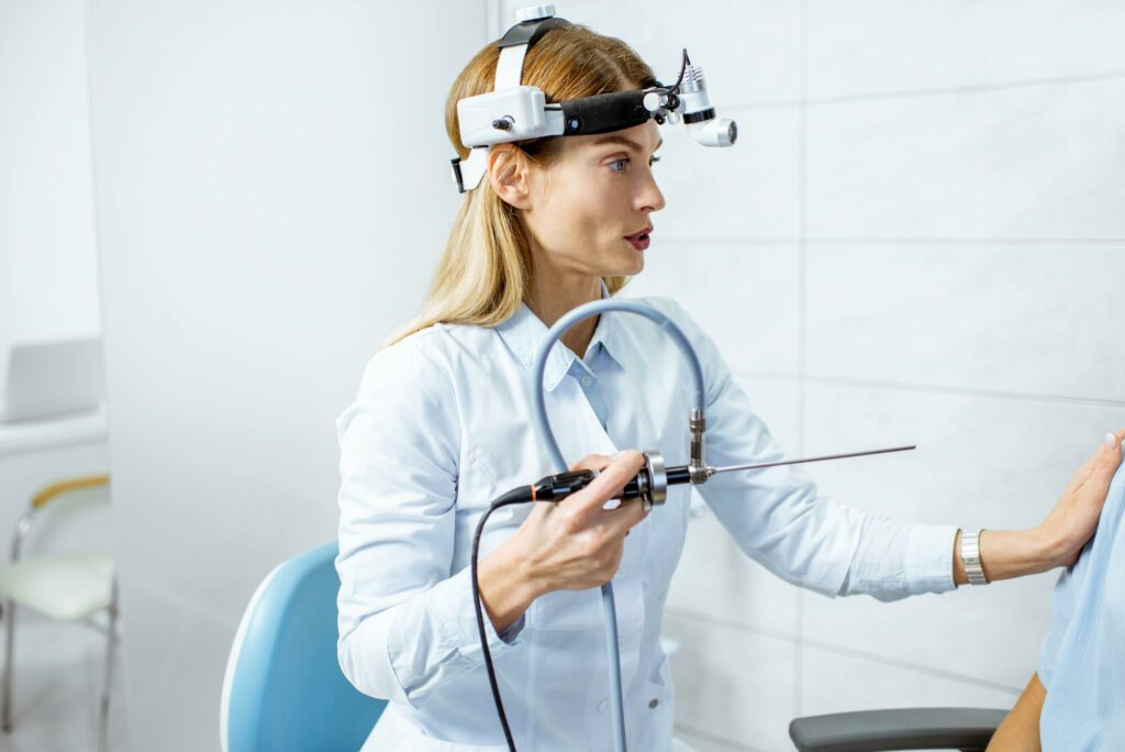 Otolaryngologist in her office